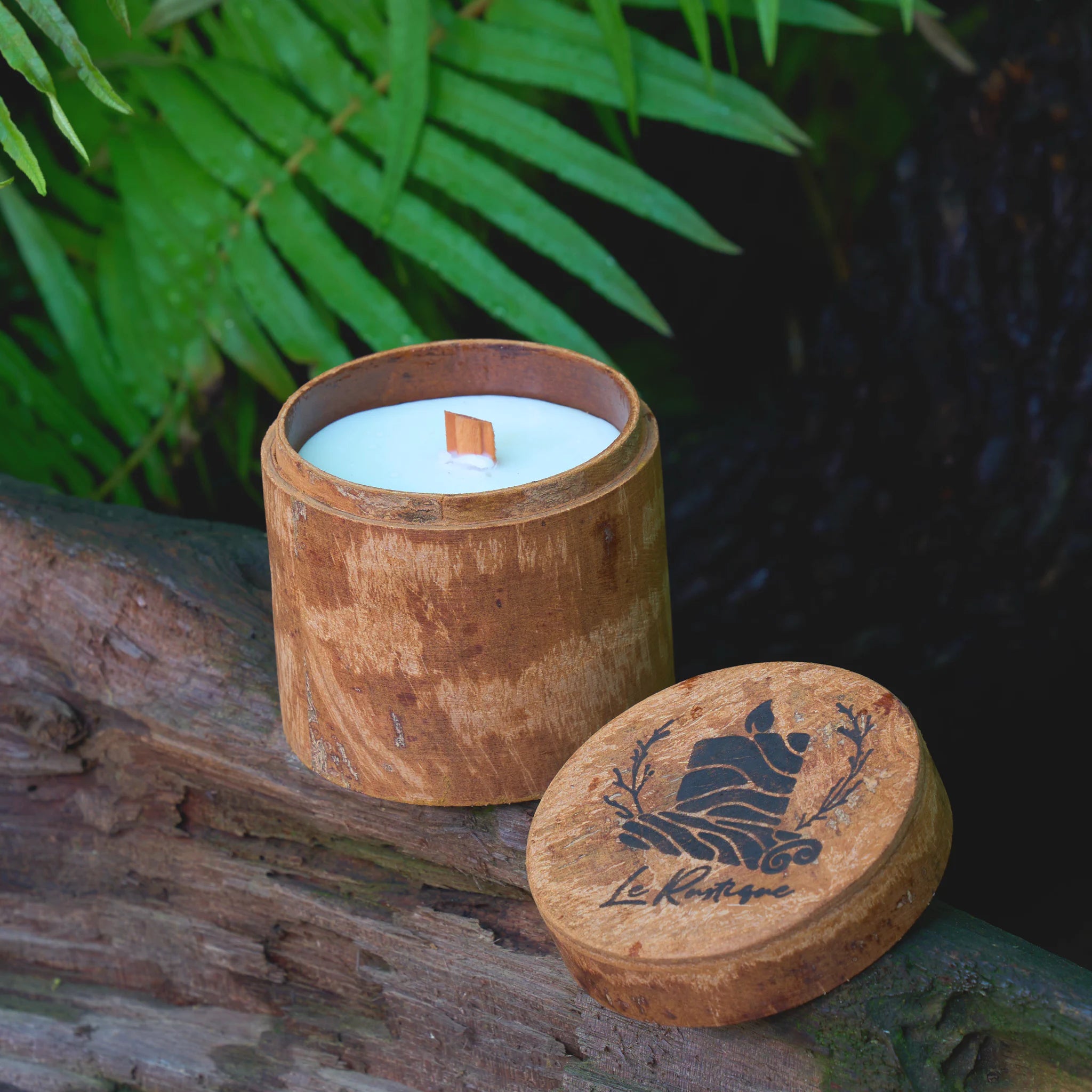 Shaven cinnamon candle jar with organic soy wax in forest